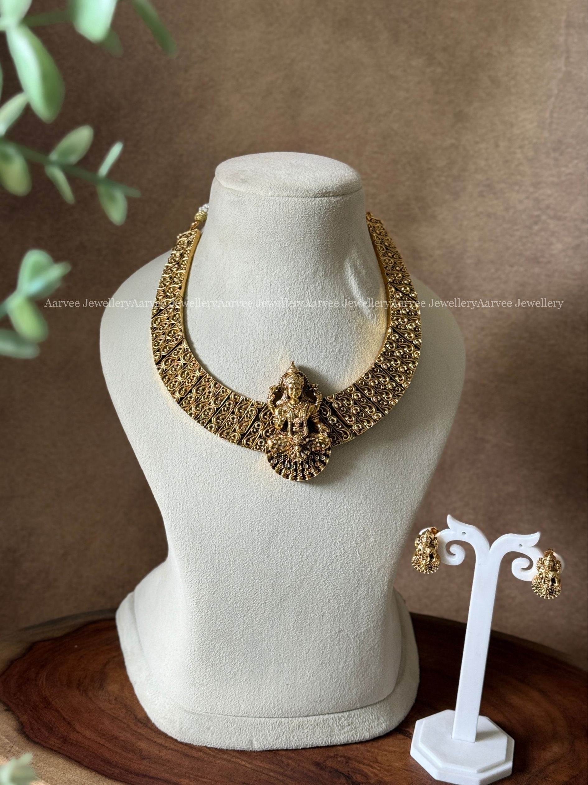 FULL GOLD TONE HASLI NECKLACE SET WITH KAMAKSHI PENDANT