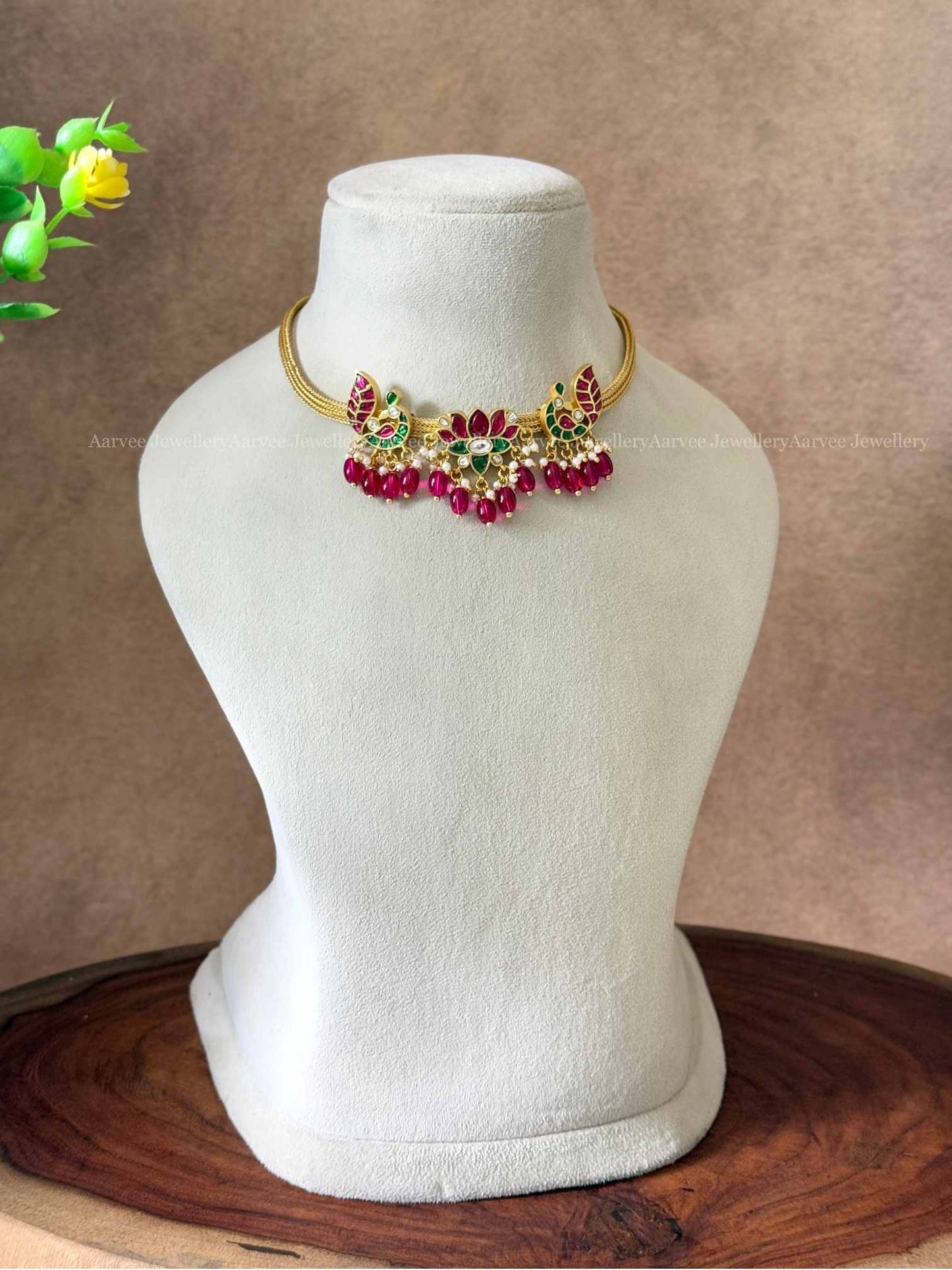 JADAU KUNDAN ANNAM AND LOTUS MOTIF NECKLACE WITH RUBY BEADS