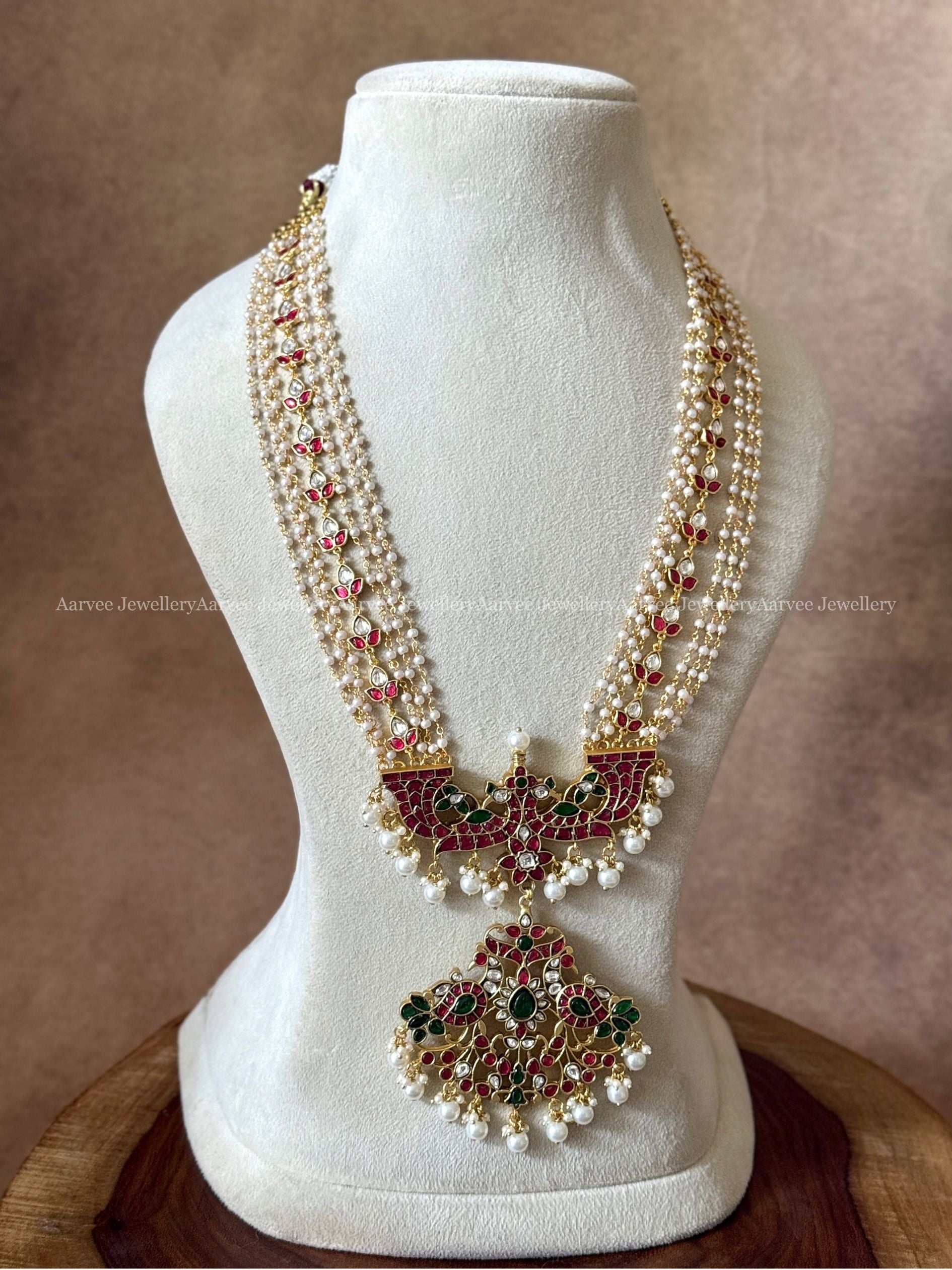 JADAU KUNDAN PEARL BEADED LAYERED MID LENGTH HARAM WITH PEACOCK PENDANT