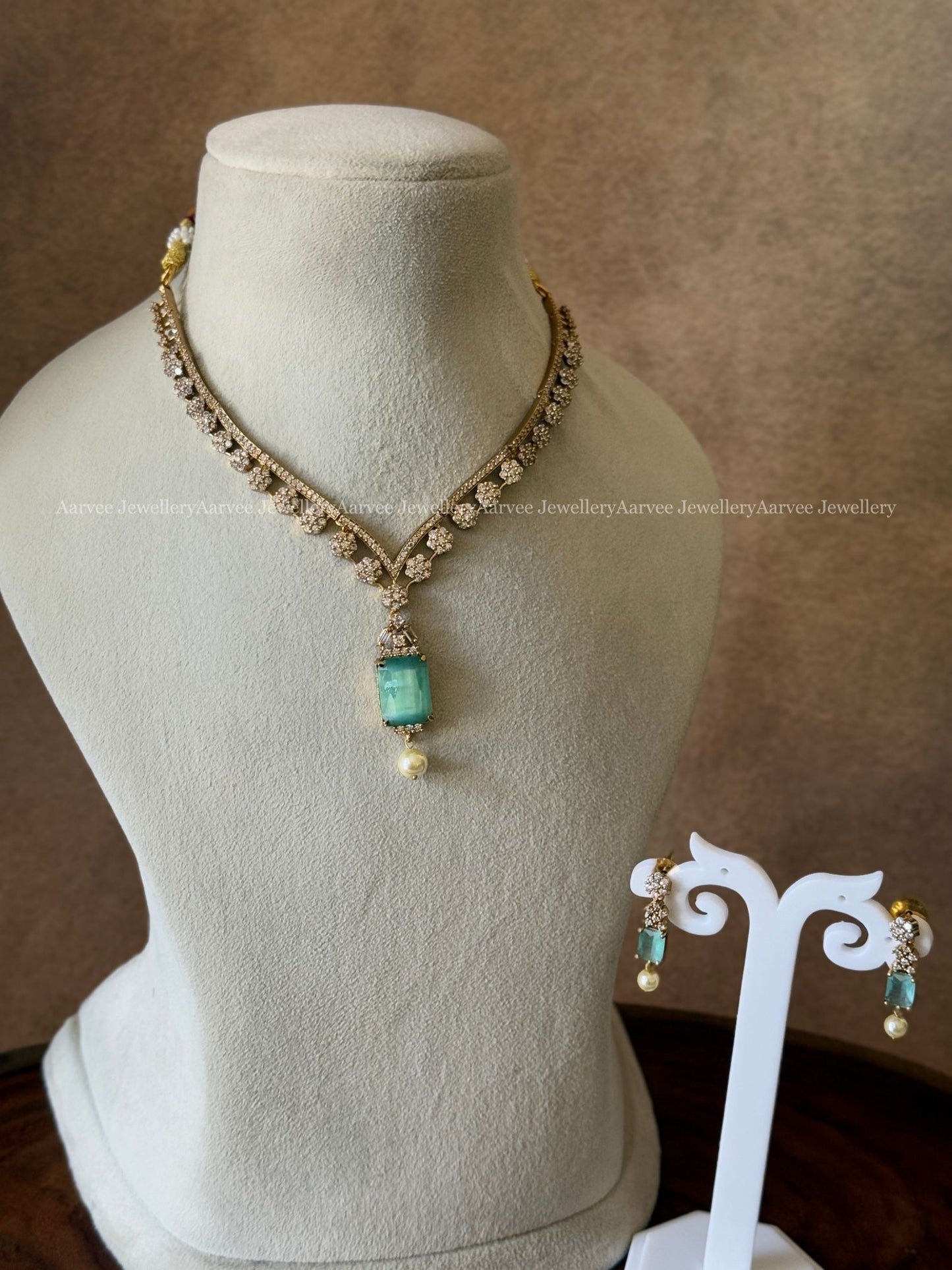 CLEARANCE - CZ NECKLACE SET WITH PASTEL BLUE STONE