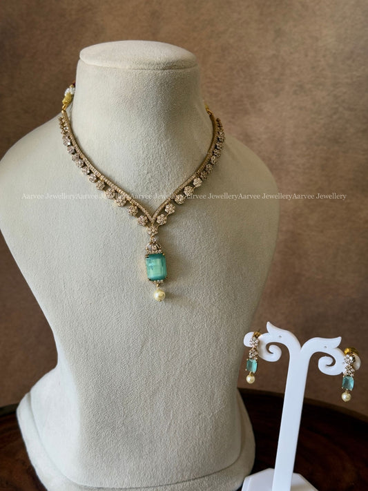 CLEARANCE - CZ NECKLACE SET WITH PASTEL BLUE STONE