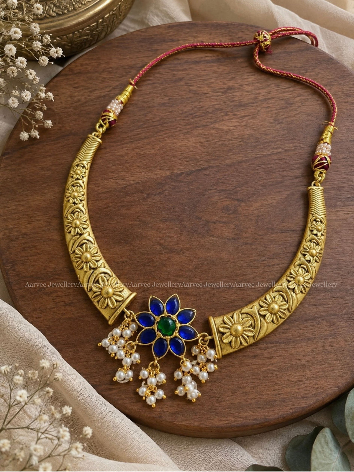 JADAU KUNDAN GOLD TONE KANTI NECKLACE WITH BLUE STONE FLORAL PENDANT 