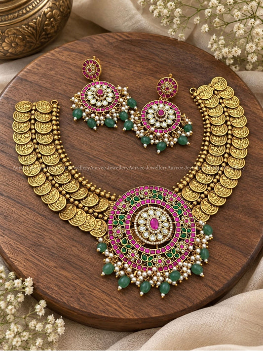PREMIUM ANTIQUE GOLD TWO LAYER LAKSHMI COIN NECKLACE SET WITH PINK KUNDAN FLORAL PENDANT