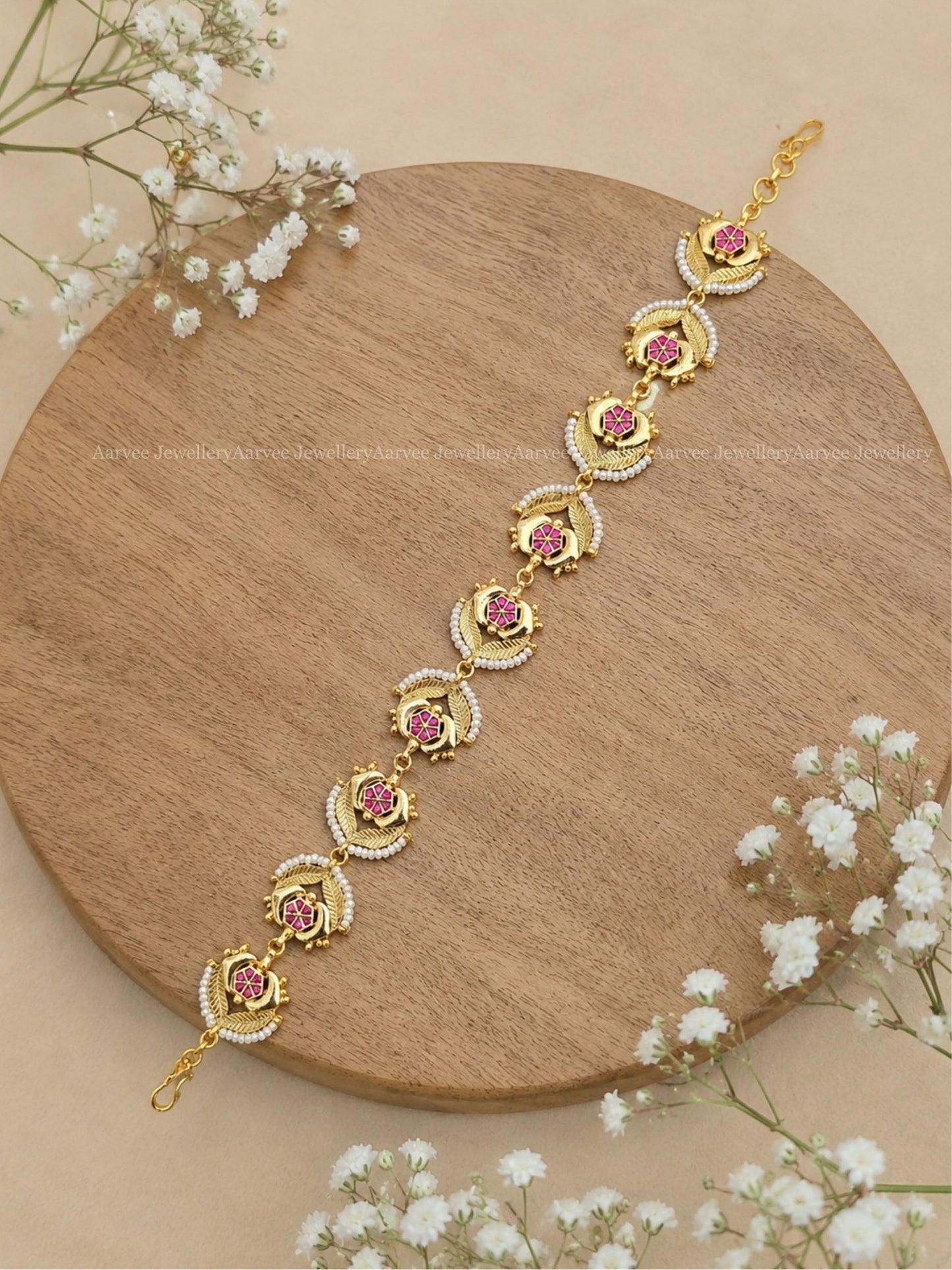 GOLD PLATED POLKI KUNDAN SHEESHPHOOL WITH PINK FLORALS