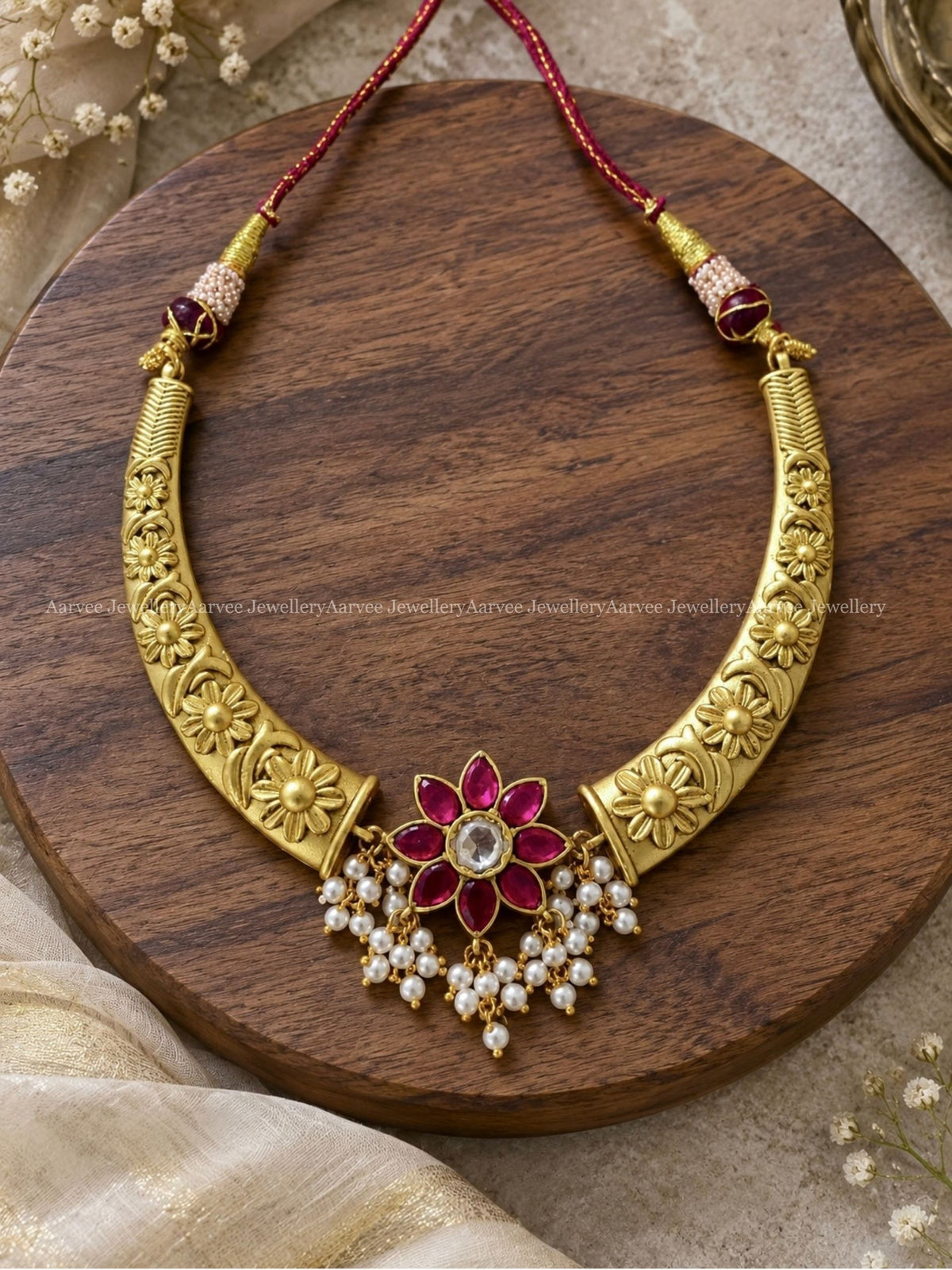JADAU KUNDAN GOLD TONE KANTI NECKLACE WITH RUBY STONE FLORAL PENDANT 
