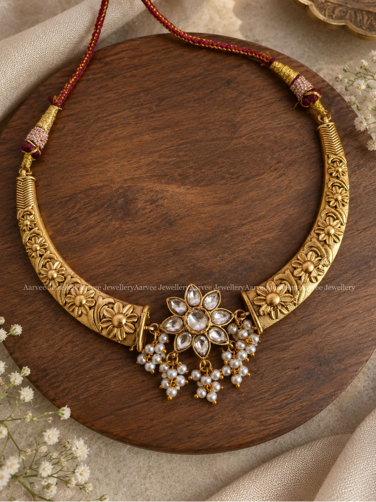 JADAU KUNDAN GOLD TONE KANTI NECKLACE WITH RUBY STONE FLORAL PENDANT 