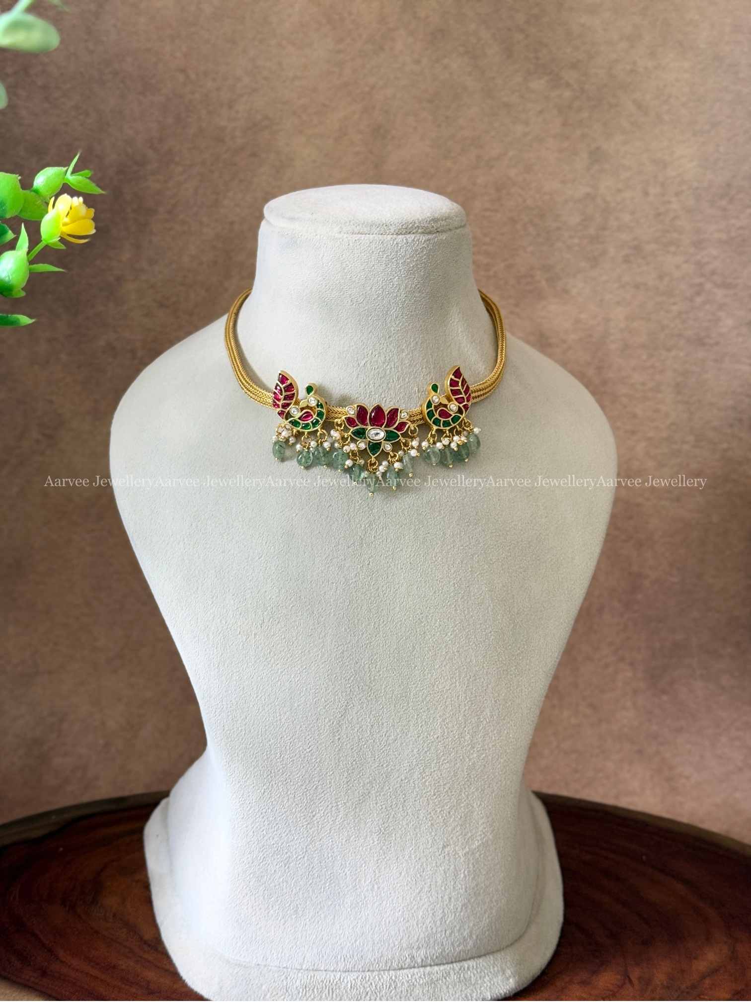 JADAU KUNDAN ANNAM AND LOTUS MOTIF NECKLACE WITH PASTEL BEADS
