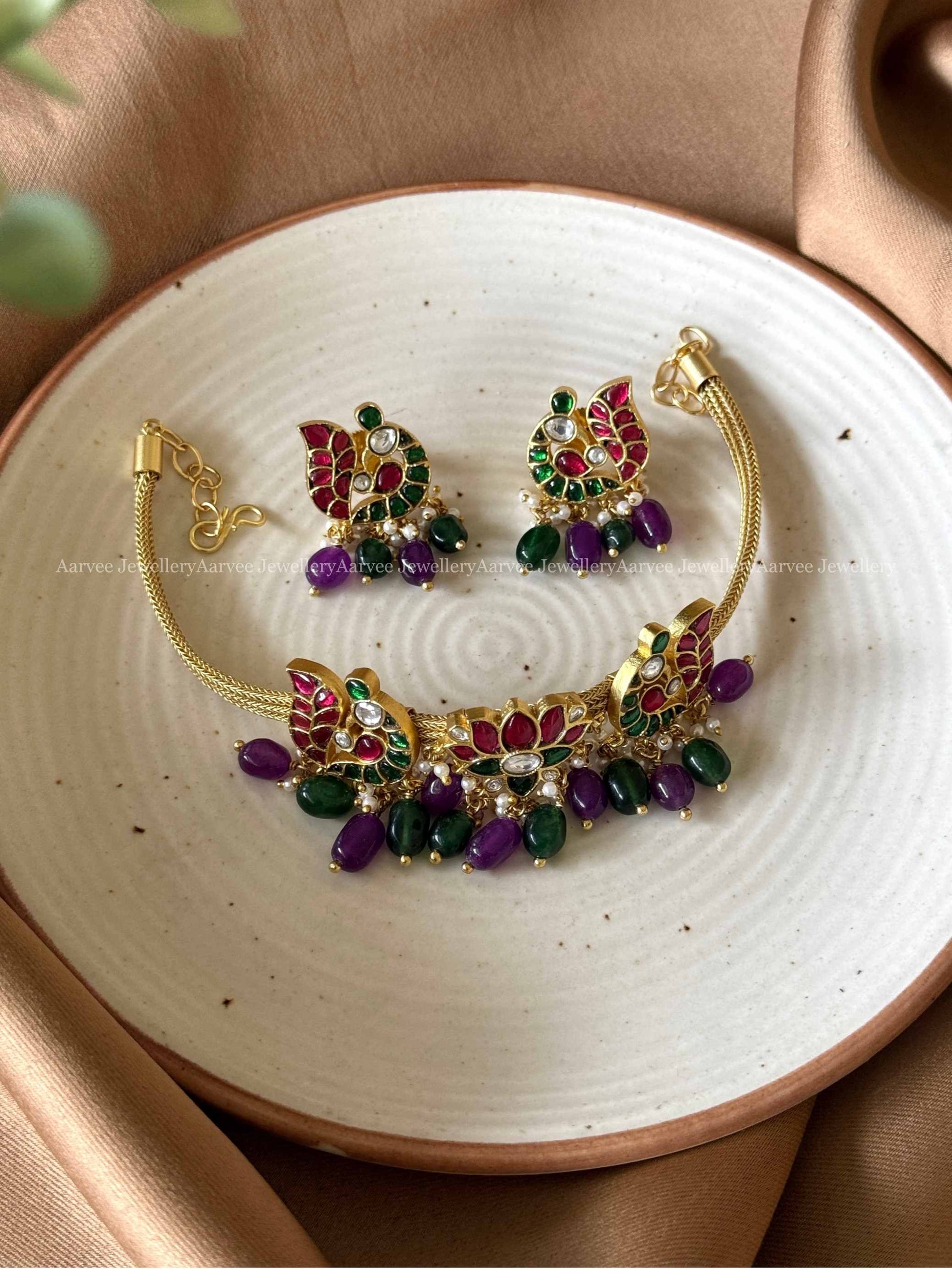 JADAU KUNDAN 3 PENDANT LOTUS & PEACOCK MESH CHAIN ATTIGAI SET WITH PURPLE AND GREEN BEADS