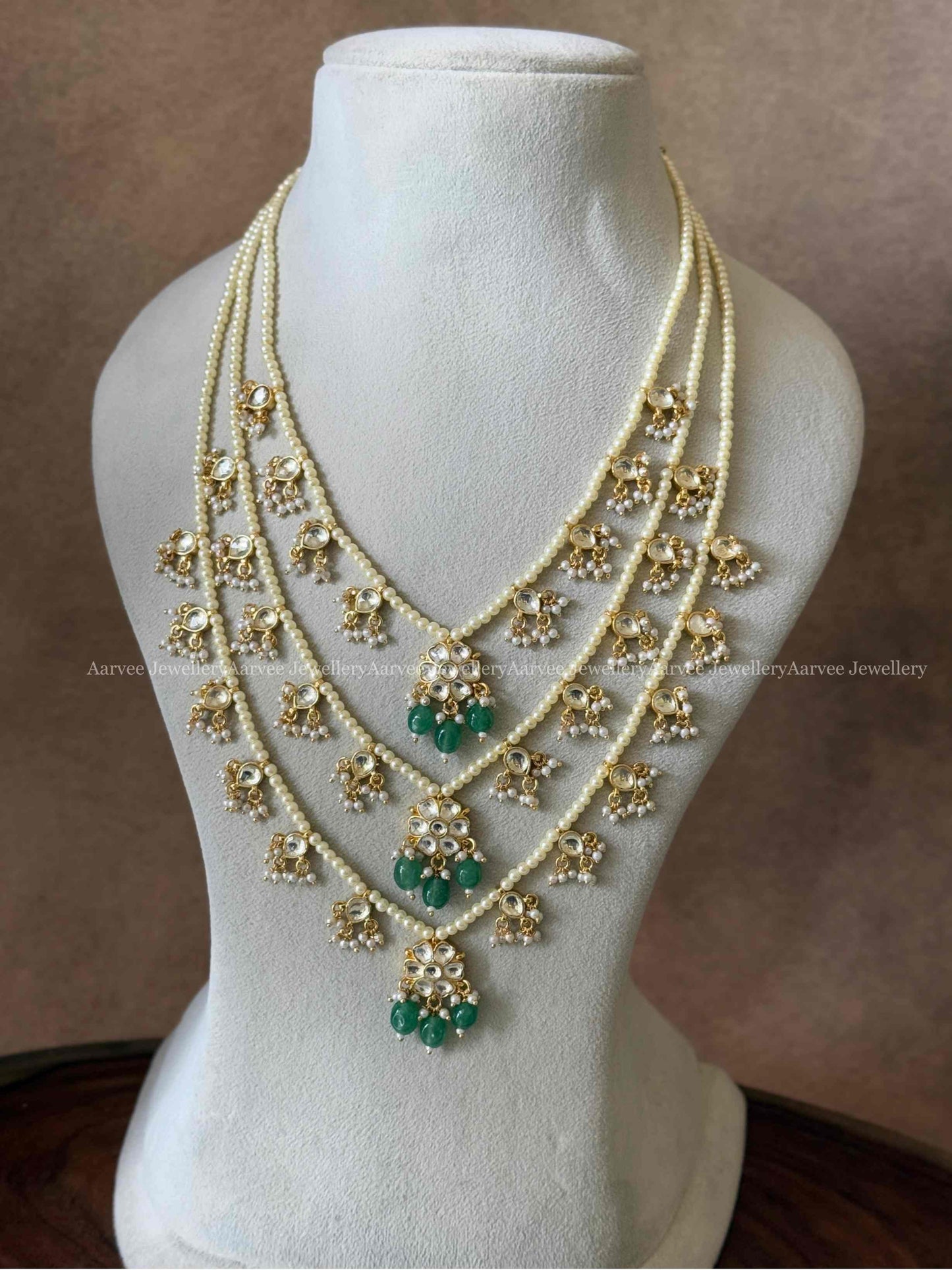 KUNDAN WHITE STONES LAYERED PEARL MIDLENGTH HARAM WITH GREEN BEAD DROPS