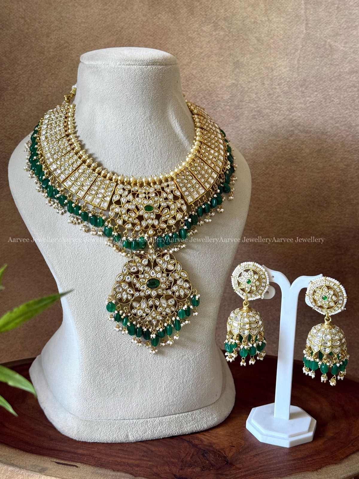 JADAU KUNDAN WHITE STONE STATEMENT NECKLACE AND BUTTA JHUMKI WITH GREEN BEADS