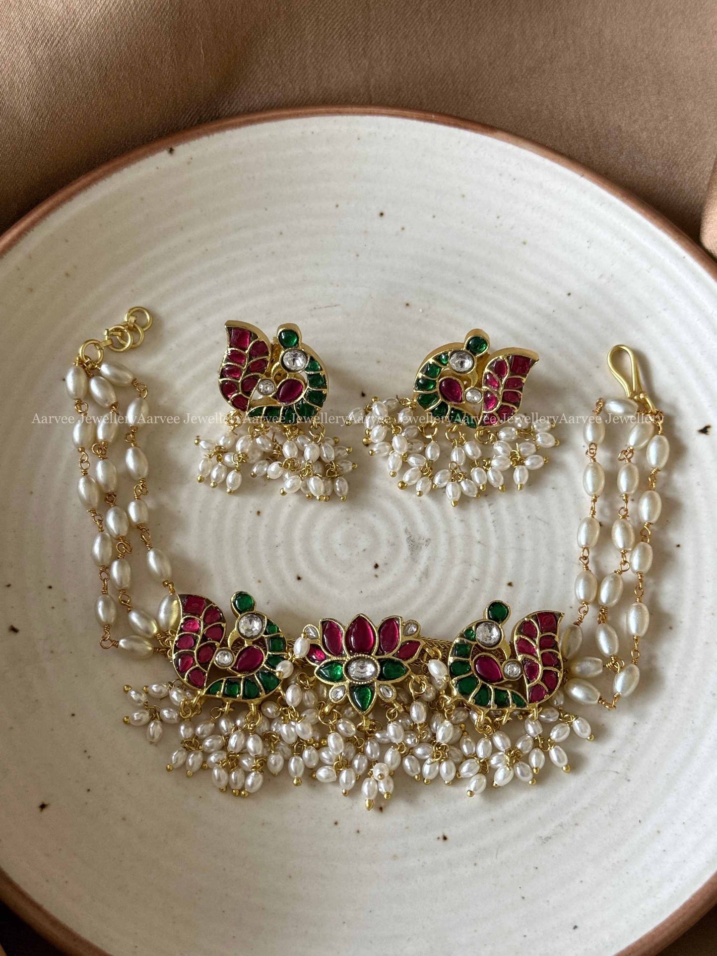 JADAU KUNDAN LOTUS & PEACOCK PEARL LINE CHOKER SET