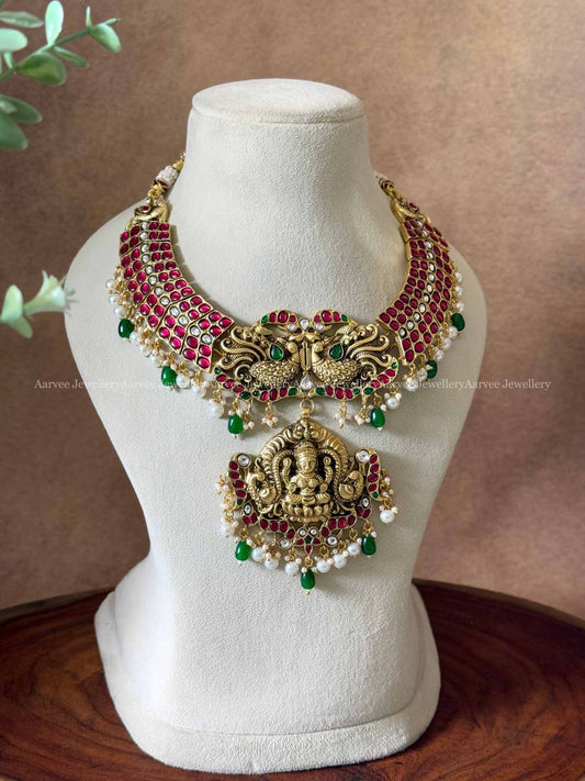 JADAU KUNDAN RUBY STONE KANTI NECKLACE WITH PEARL AND GREEN BEADS