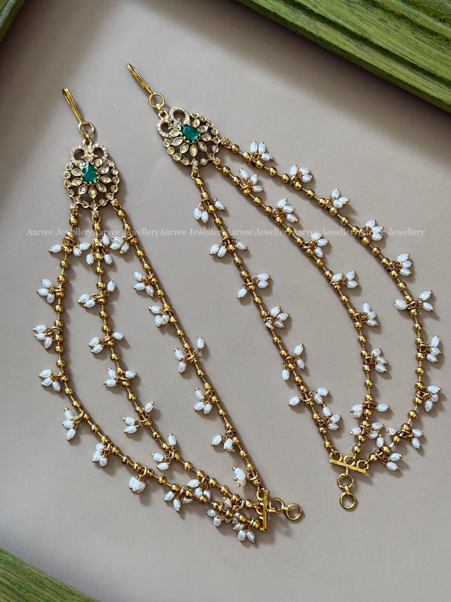 GOLD BEAD LAYERED EAR CHAIN WITH GREEN CZ STONES