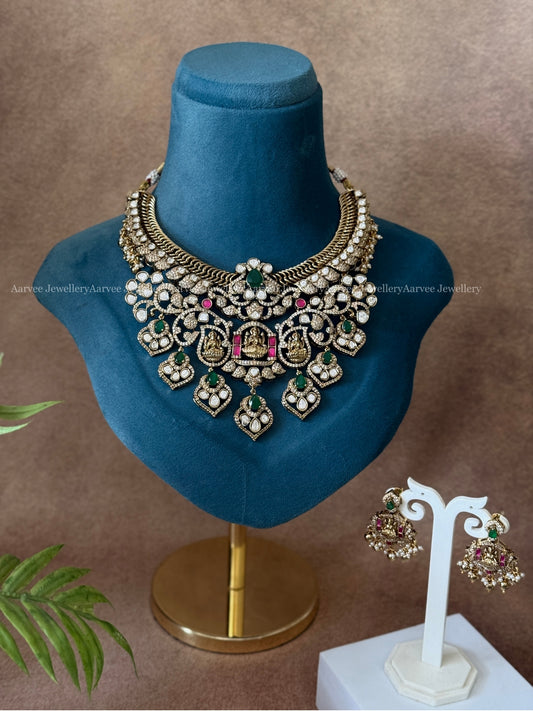 STATEMENT JALEBI NECKLACE WITH TEMPLE MOTIF WITH WHITE/PINK/RUBY STONES