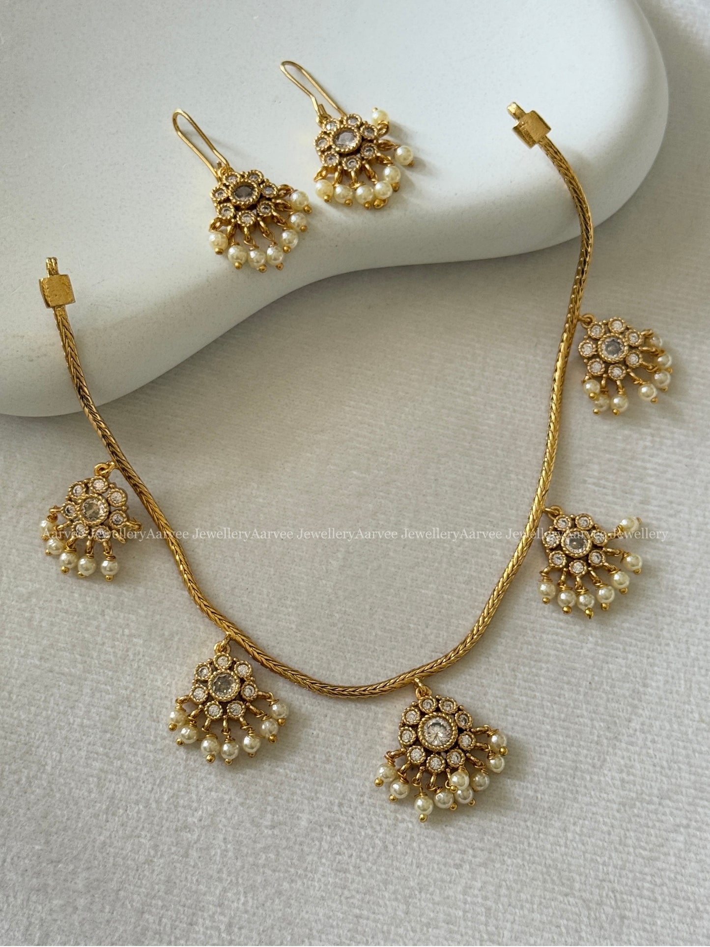 DELICATE FLORAL MULTI PENDANT NECKLACE SET IN WHITE STONES