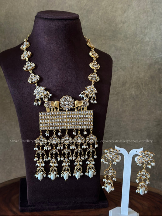 JADAU KUNDAN ELEPHANT & LOTUS MOTIF NECKLACE SET WITH WHITE STONES & PEARLS