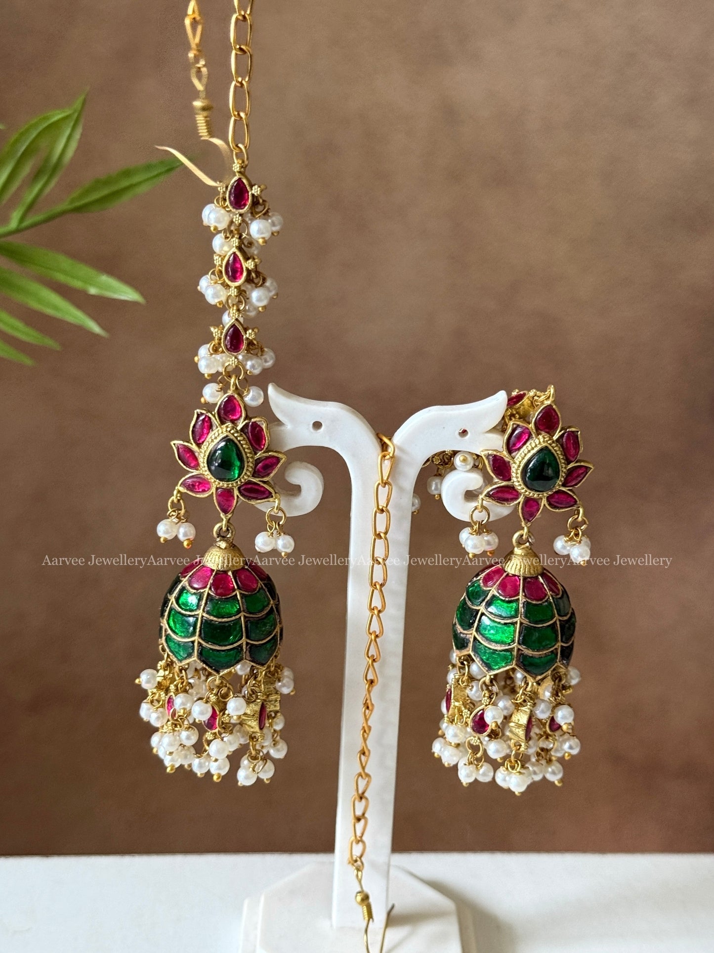 JADAU KUNDAN GREEN / RUBY STONE FLORAL JHUMKI WITH ATTACHED EAR CHAIN