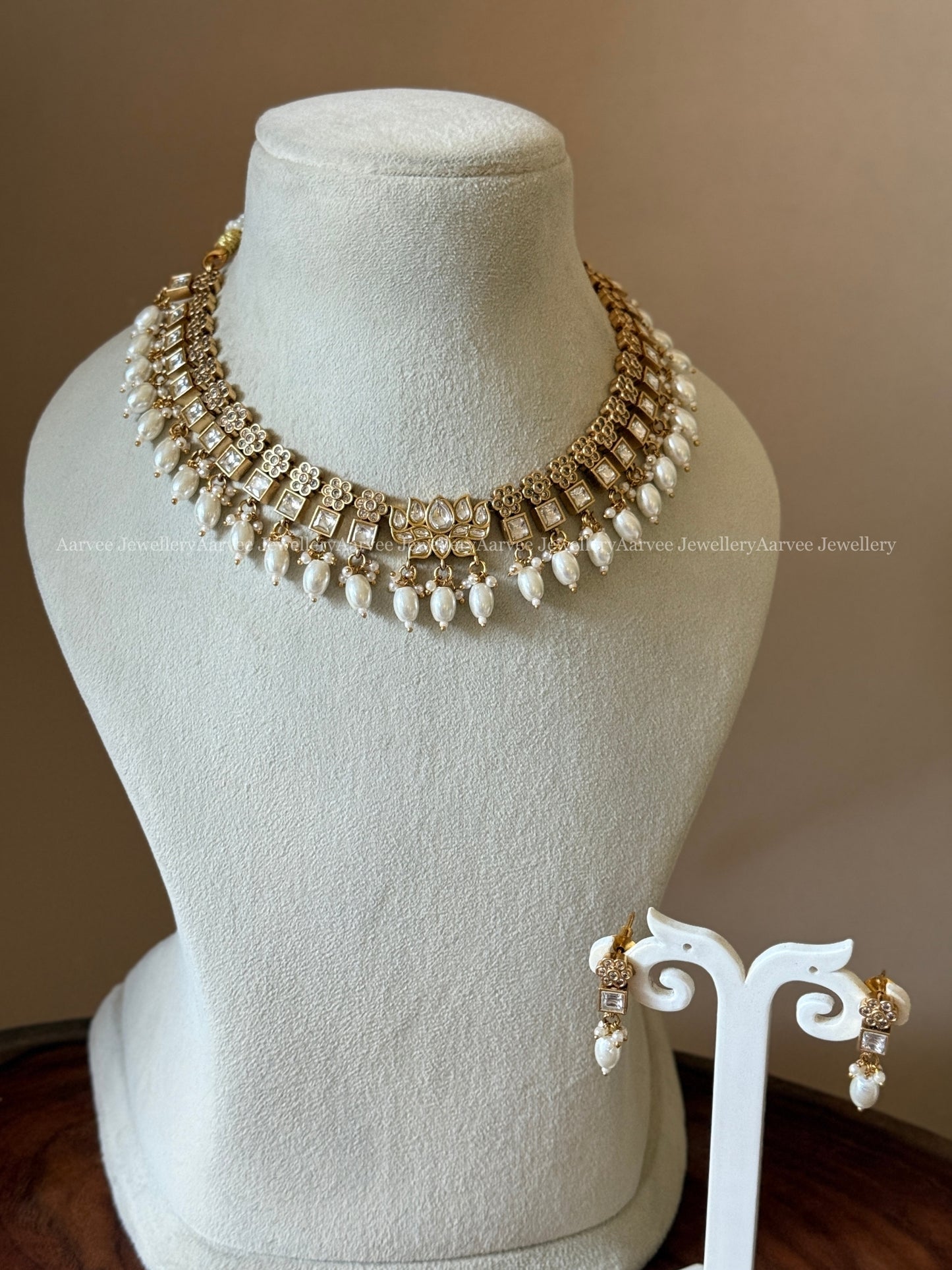 ELEGANT WHITE STONE FLORAL NECKLACE SET WITH LOTUS PENDANT & PEARL BEADS