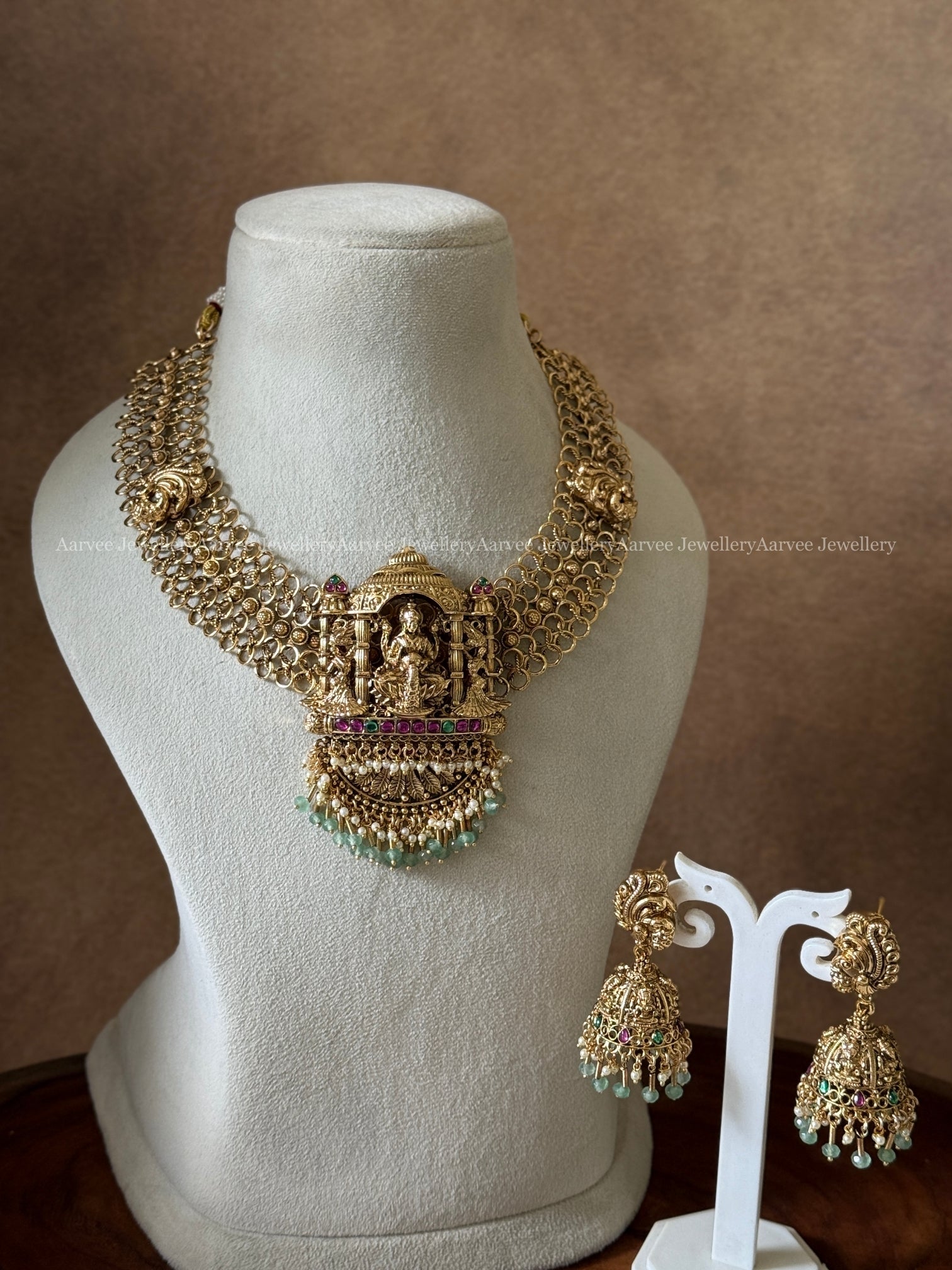 PREMIUM ANTIQUE GOLD FINISH MESH DESIGN LAKSHMI NECKLACE SET WITH PASTEL BEADS