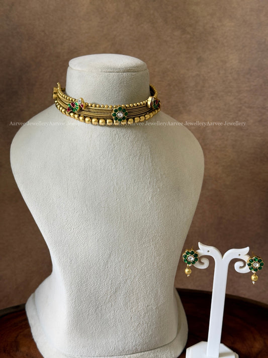JADAU KUNDAN MINIMAL HIGHNECK CHOKER SET WITH FLORAL & PARROT MOTIF