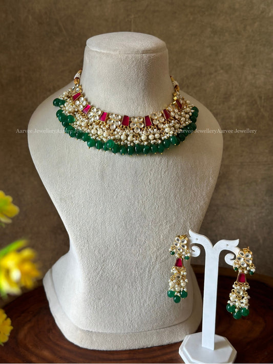 POLKI KUNDAN FLORAL DESIGN NECKLACE SET IN RUBY STONES & GREEN BEADS