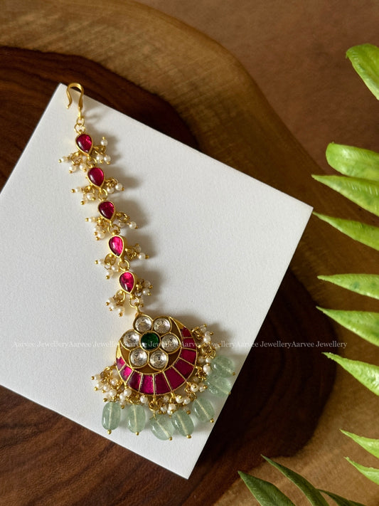JADAU KUNDAN HALF MOON DESIGN TIKKA WITH RUBY STONES AND PASTEL BEADS