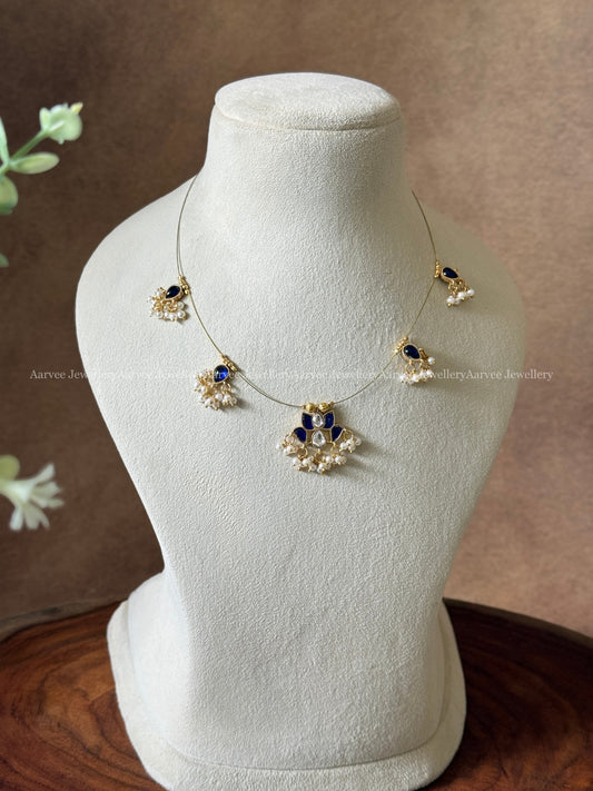 INVISIBLE CHAIN WITH LOTUS PENDANT IN  BLUE / WHITE KUNDAN STONE