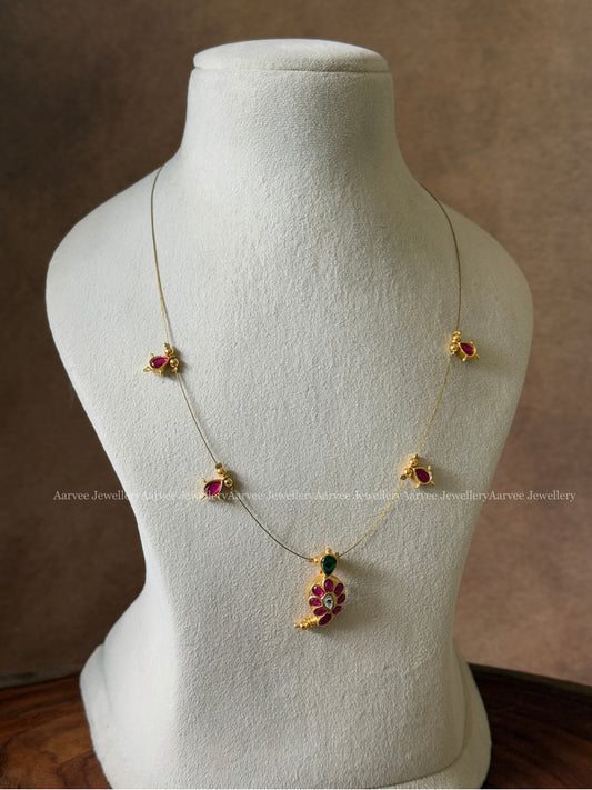 INVISIBLE CHAIN WITH JADAU KUNDAN RUBY STONE MANGO MOTIF PENDANT