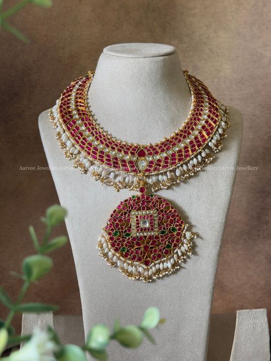 JADAU KUNDAN RUBY STONE STATEMENT NECKLACE WITH FLORAL PENDANT WITH RICE PEARLS