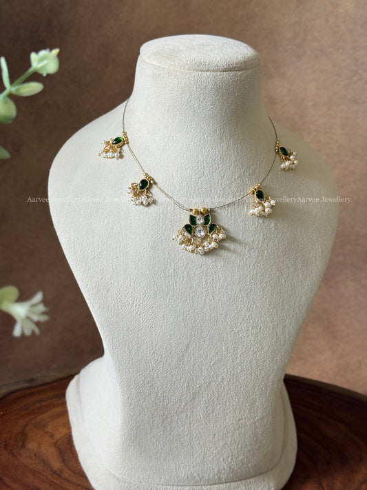 INVISIBLE CHAIN WITH LOTUS PENDANT IN  GREEN / WHITE KUNDAN STONE