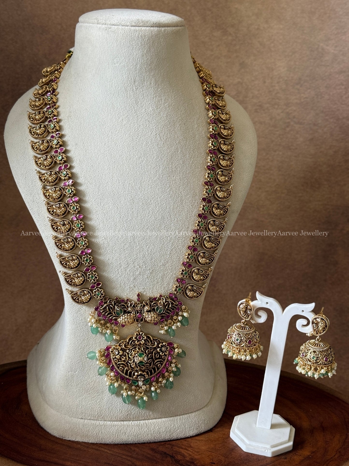 PREMIUM ANTIQUE GOLD KUNDAN STONES PEACOCK MOTIF HARAM SET WITH PASTEL BEADS
