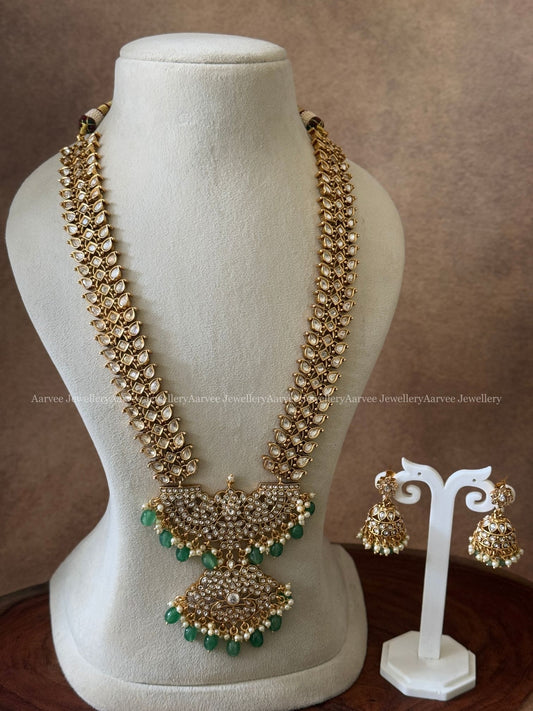 WHITE KUNDAN STONE HARAM SET WITH NON IDOL PENDANT AND PASTEL BEADS