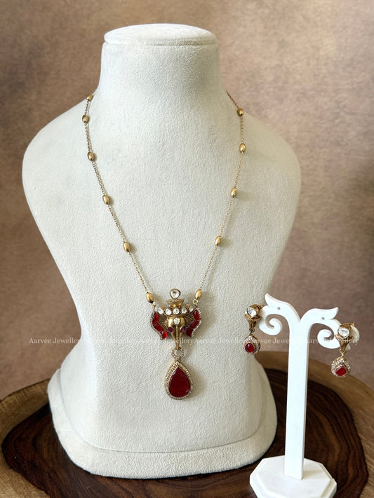 GOLD MID LENGTH CHAIN SET WITH ELEPHANT PENDANT IN RUBY STONES