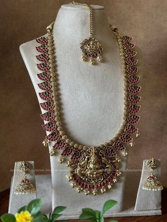 TEMPLE-STYLE HARAM WITH LAKSHMI PENDANT, RUBY AND GREEN STONE EMBELLISHMENTS