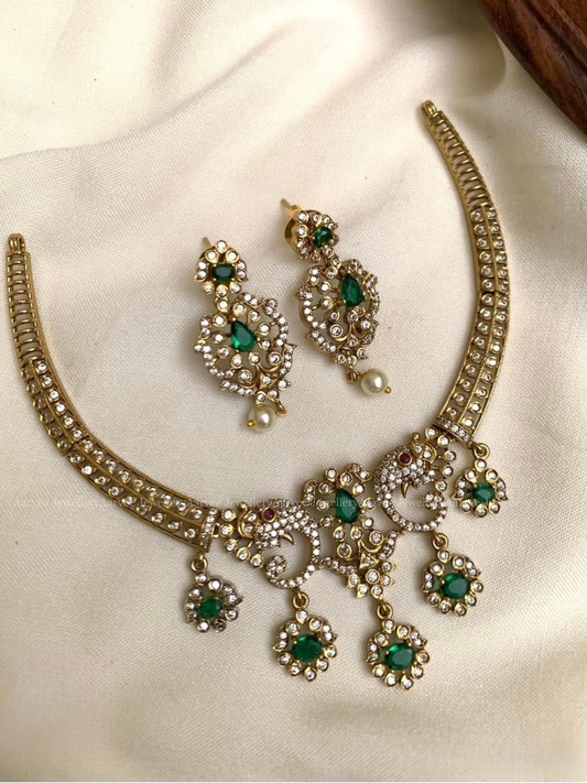 MINIMAL GOLD FINISH KANTI NECKLACE SET WITH GREEN CZ STONES