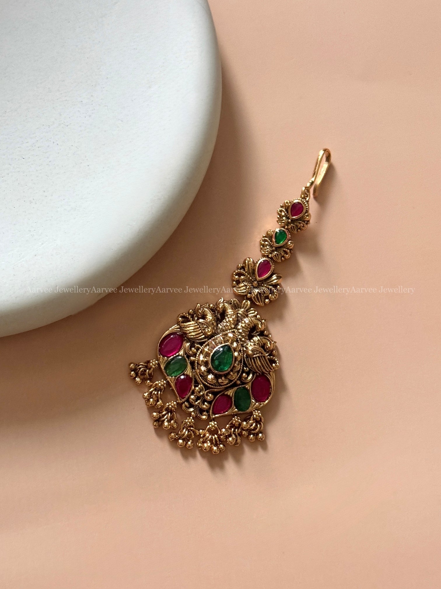 ANTIQUE GOLD FINISH PEACOCK MOTIF KEMP STONE TIKKA WITH GOLD BEADS