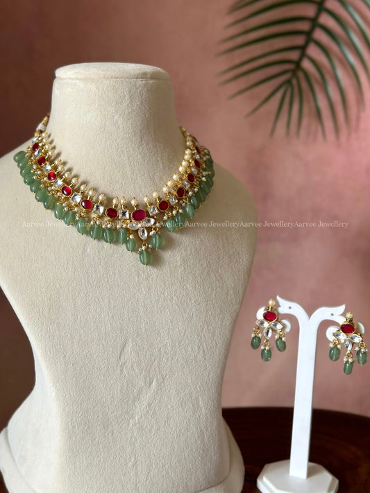 POLKI KUNDAN NECKLACE SET WITH RED STONES AND PASTEL BEADS