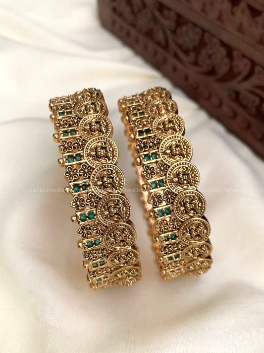 GOLD FINISH LAKSHMI COIN BANGLES WITH GREEN STONES