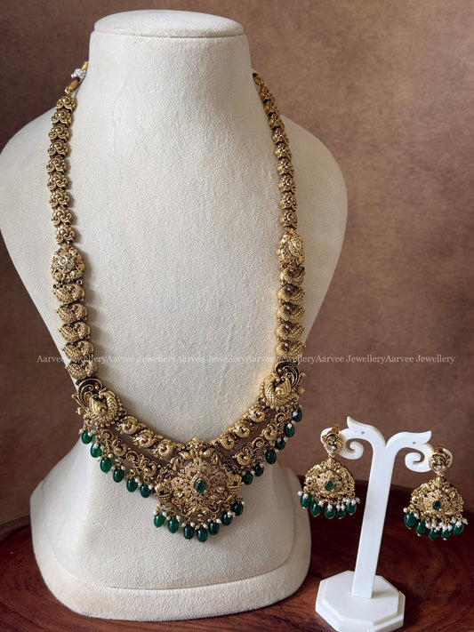 GOLD FINISH NON IDOL HARAM SET WITH GREEN BEADS