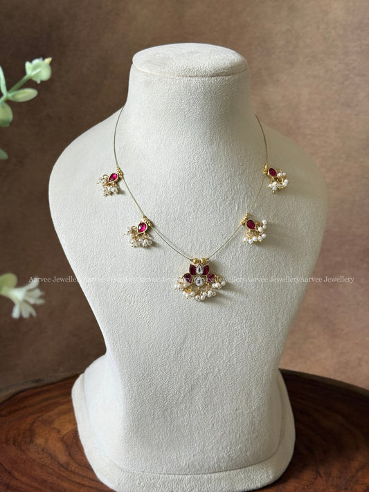 INVISIBLE CHAIN WITH LOTUS PENDANT IN RUBY / WHITE KUNDAN STONE