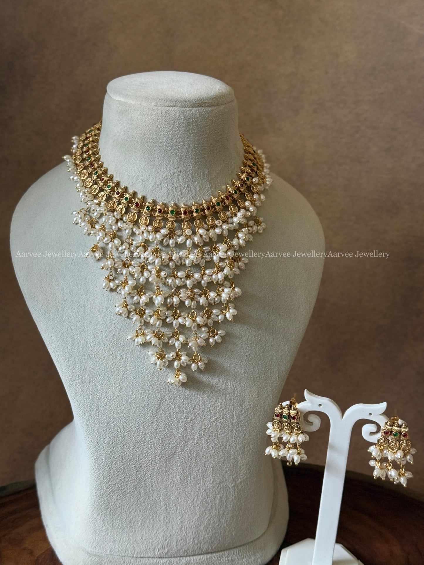 GOLD FINISH LAYERED PEARL NECKLACE SET
