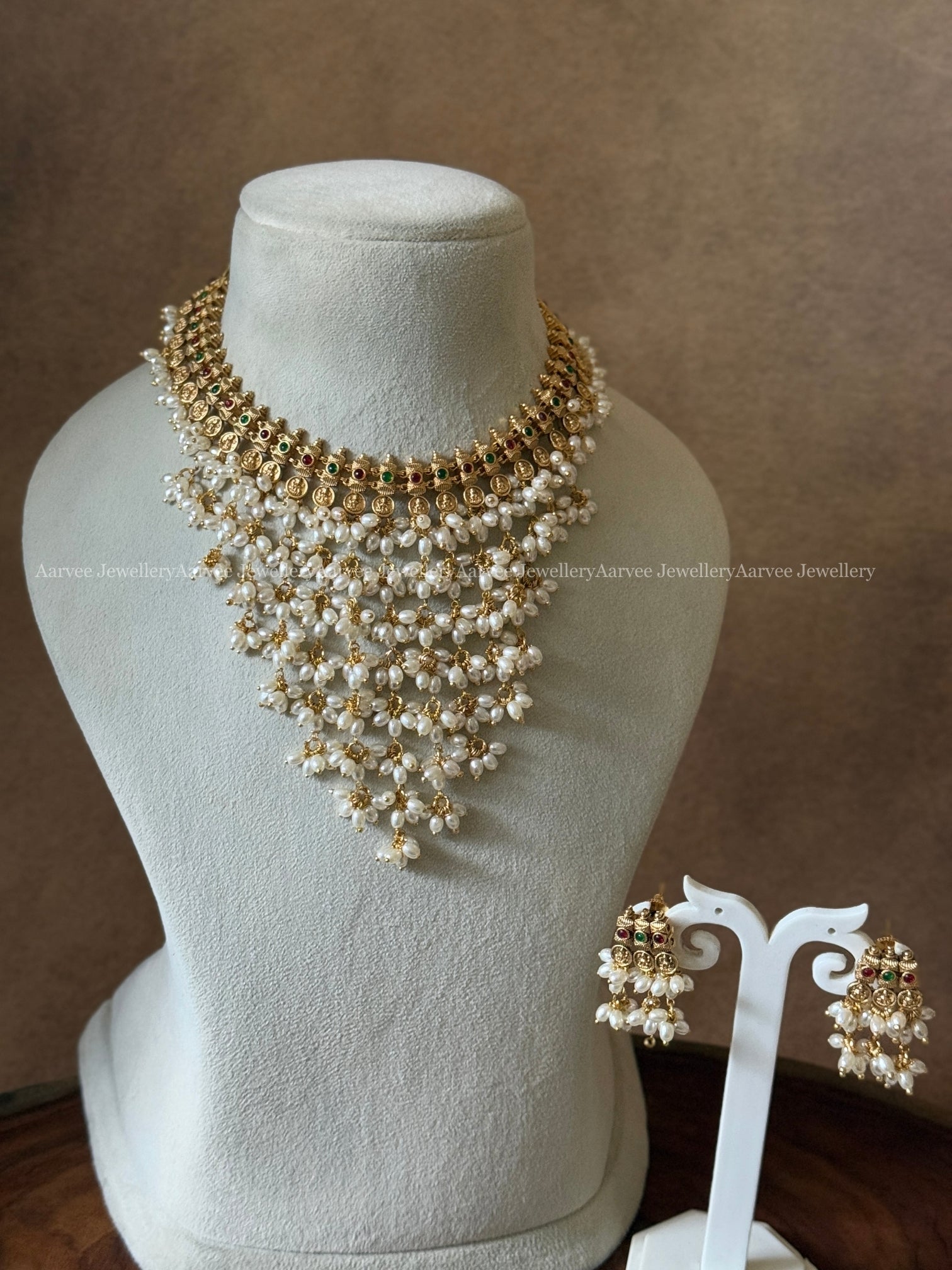 GOLD FINISH LAYERED PEARL NECKLACE SET
