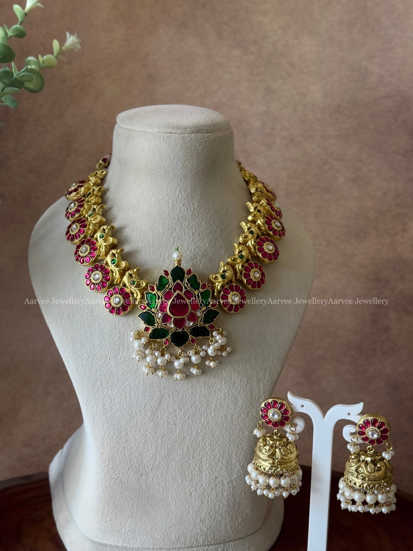 JADAU KUNDAN RUBY STONE BUTTA NECKLACE SET WITH LOTUS PENDANT