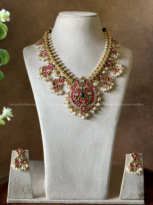 SEMI PRECIOUS KEMP STONES GUTTA PUSALU NECKLACE SET WITH PEACOCK PENDANT & RICE PEARLS | GOLD FINISH