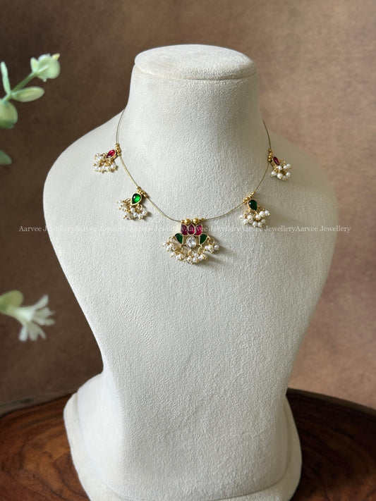 INVISIBLE CHAIN WITH LOTUS PENDANT IN  RUBY / GREEN KUNDAN STONE