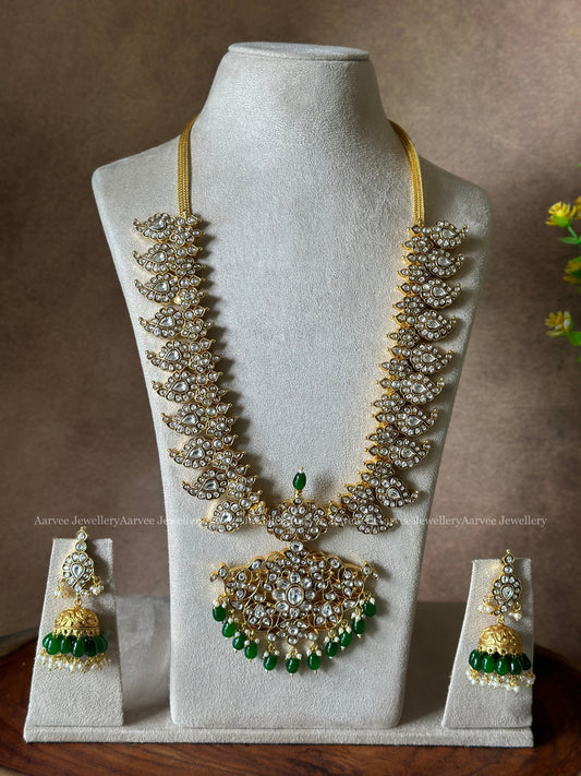 JADAU KUNDAN MANGO MOTIF MID LENGTH HARAM SET WITH WHITE STONES & GREEN BEADS