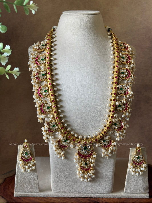 SEMI PRECIOUS KEMP STONE GUTTA PUSALU HARAM SET WITH FLORAL PENDANT AND RICE PEARLS | GOLD FINISH