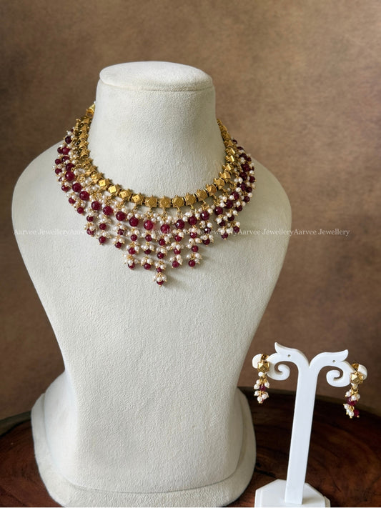 GOLD BALL BEAD NECKLACE WITH LAYERED RUBY BEAD DROPS
