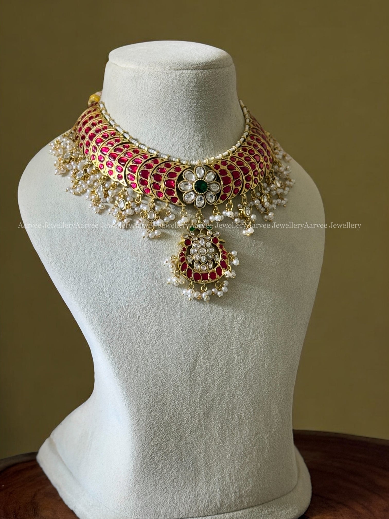 JADAU KUNDAN RUBY STONE CRESCENT NECKLACE WITH FLORAL PENDANT AND WHITE STONE DROPS