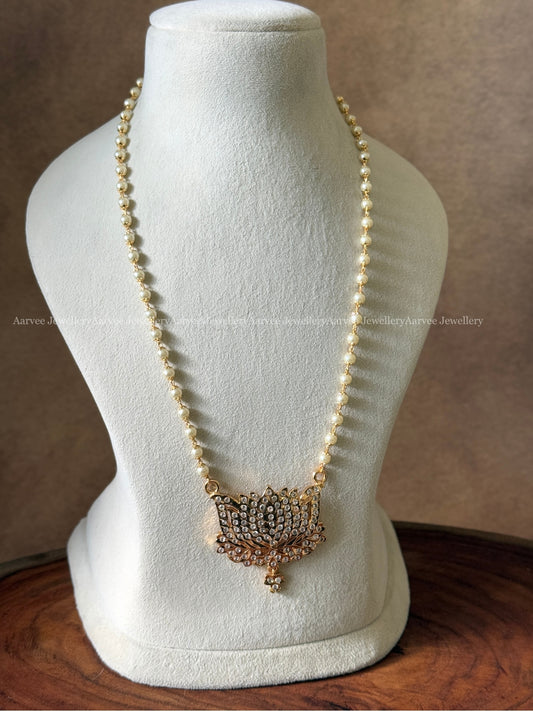 SINGLE LINE PEARL MID LENGTH CHAIN WITH LOTUS WHITE STONE PENDANT